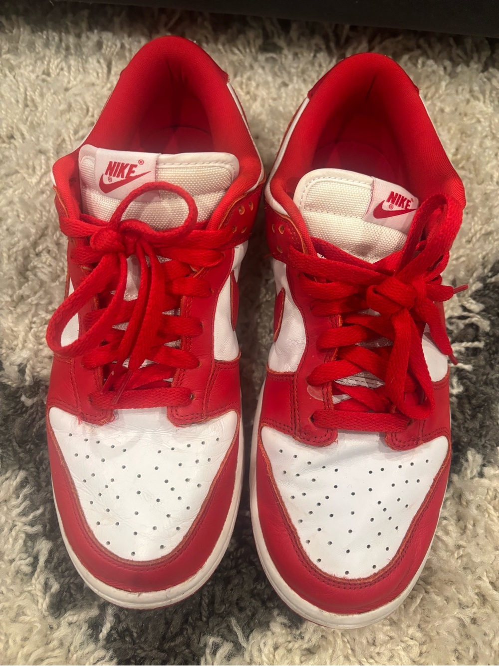 Nike Red and White Low-Top Sneakers with Bold Red Accents